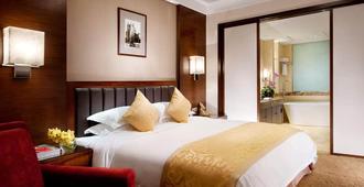 Yidu Jinling Grand Hotel Yancheng - Yancheng - Bedroom