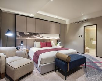 كراون بلازا مانيلا جاليري ا باي آيتش جي - Pasig - غرفة نوم