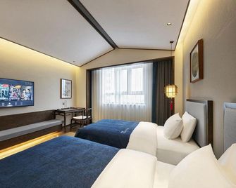 Qianna Hotel Fine (Kaifeng Millennium City Park ) - Kai Feng - Camera da letto