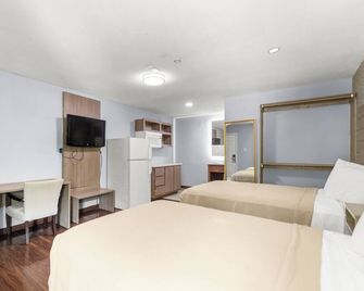 Travel Inn & Suites - Humble - Habitación