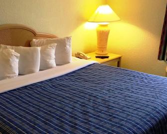 Cocoa Beach Suites Hotel - Cocoa Beach - Slaapkamer