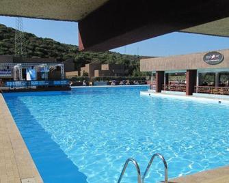 سنترو فافكنزي كونيانا فيردي - أولبيا