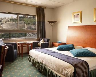 Concord Hotel - עמאן - חדר שינה
