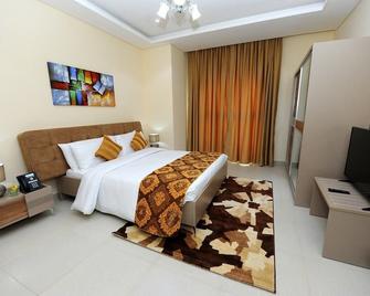 Al Mansour Park Inn Hotel&Apartment - Doha - Sovrum