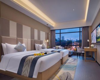 Eyston Hotel - Changsha - Schlafzimmer