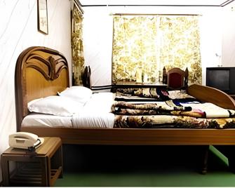 Himgiri Resorts - דרמאסאלה - חדר שינה