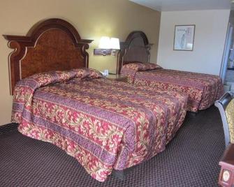 Texan Inn and Suites Monahans - Monahans - Спальня