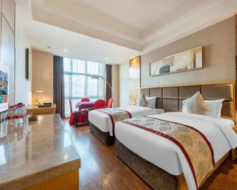 Kanglaibo International Hotel (Hongqi Avenue, Zhanggong District, Ganzhou) - Ganzhou - Спальня