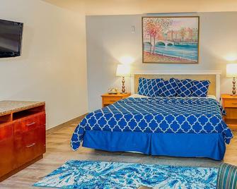 Americas Inn and Suite - Shoreline - Bedroom