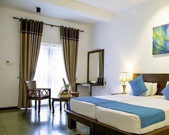 Coco Royal Beach Resort - Kalutara - Sovrum