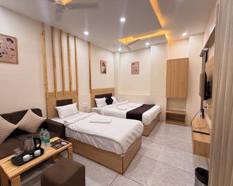 Hotel Kusum Kunj - אויאיין - חדר שינה