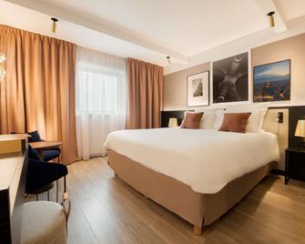 Golden Tulip Cdg Airport Roissy - רואזי אן-פראנס - חדר שינה