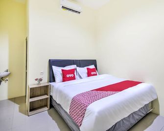 Hotel O Tebel 19 - Surabaya - Schlafzimmer