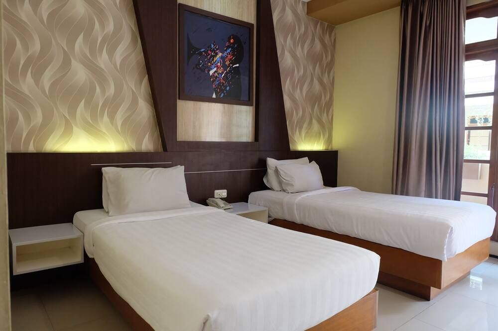 Votel Kartika Abadi Hotel Madiun - Madiun - Slaapkamer