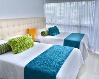 مونتاروسا أبارتامنتوس آموبلادوس - بيريرا - غرفة نوم