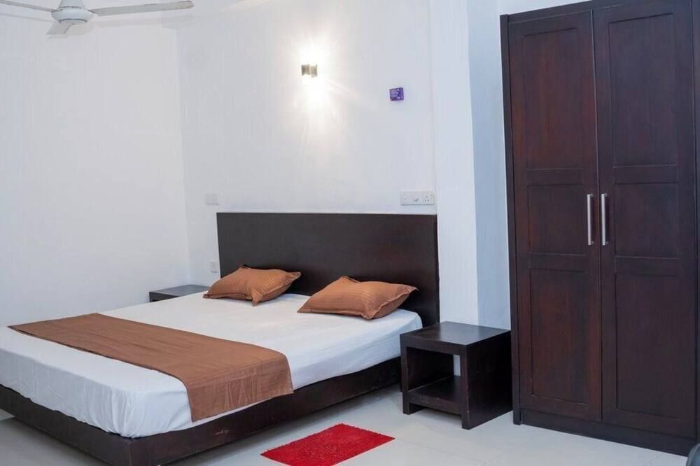 Yash Rest Inn - נגומבו - חדר שינה