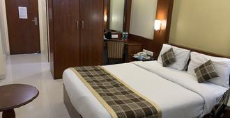 Hotel Shubhangan - Mumbai - Bedroom