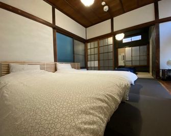 yokohama guesthouse haco tatami - יוקוהאמה - חדר שינה
