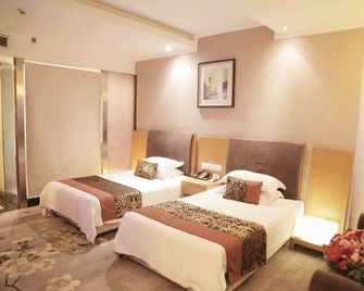 Ejon Impression Hotel Yiwu - ז'ינהואה - חדר שינה