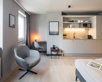 Design Studio Apartment Frankfurt Main Station - Frankfurt am Main - Living room