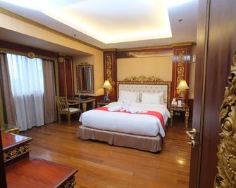 Grand Orchid Hotel - Surakarta City - Soveværelse
