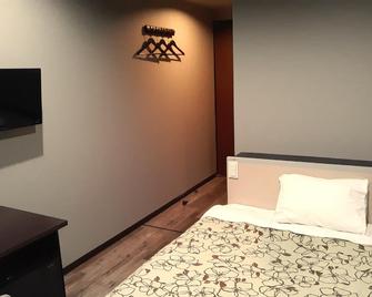 Business Hotel Park Inn Sato - Hita - Slaapkamer