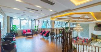 Haoyi Hotel (Chengdu Shuangliu Airport Airport Sichuan University) - Chengdu - Sala de estar
