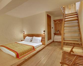 Chevron Eco Lodge - Kausani - Ložnice