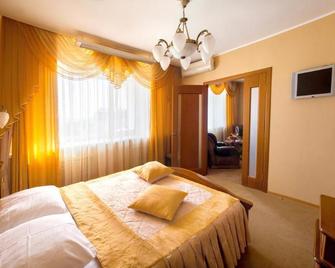 Hotel Oktyabrskaya - Ulyanovsk - Bedroom