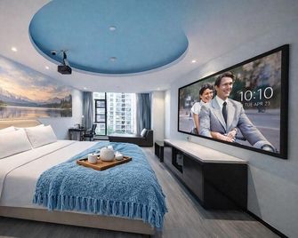 Tianhai Sixi Hotel (Jiujiang Liansheng Happy City International Convention and Exhibition Center) - Jiujiang - Bedroom