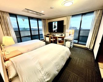Sun City Hotel Yamashiro - Kaga - Slaapkamer