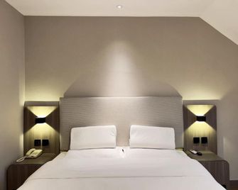 Hanting Hotel Yantai South Railway Station - Yantai - Bedroom
