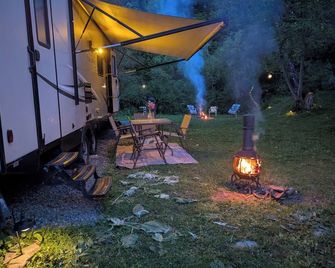 'Pondside Camper Haven: Full Hookups + Hot Water! Near Letchworth State Park - Dansville - Patio