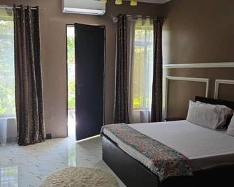 Maggie Resthouse - Dar Es Salaam - Habitació