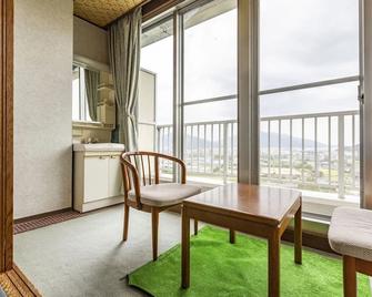 Tsuruga Tunnel Onsen Kitaguni Grand Hotel - Tsuruga - Stue