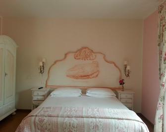 B&B Corte Frisonai - Bardolino - Schlafzimmer
