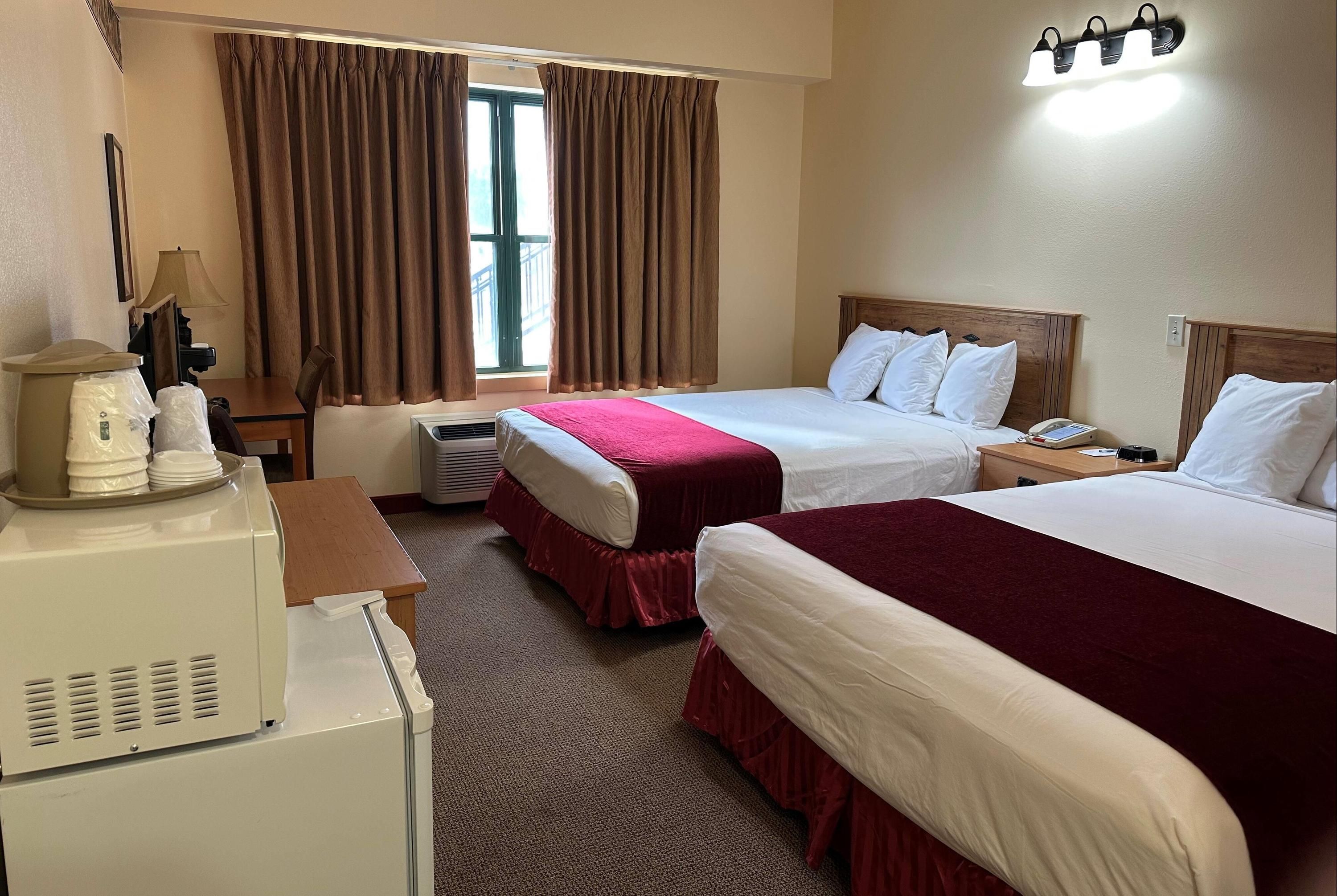 Travelodge Inn & Suites by Wyndham Deadwood - דדווד - חדר שינה