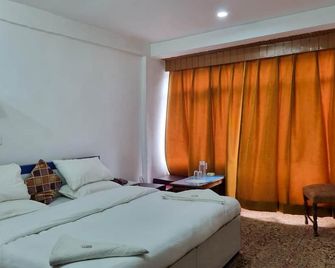 Central Hotel - Pahalgam - Schlafzimmer