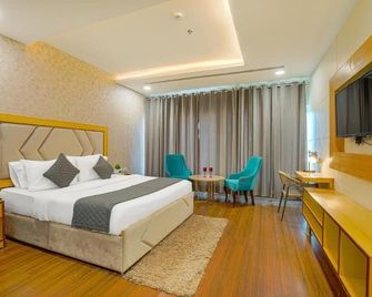 The Stories Hotel - Ludhiana - Schlafzimmer