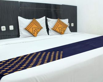 Hotel O Transit 2 - Makassar - Bedroom