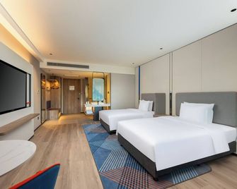 هوليداي إن إكسبرس لويانج لونجمِب باي آيتش جي - لويانغ - غرفة نوم