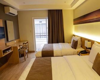 iコーヴ ビーチ ホテル - オロンガポ - 寝室