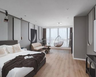 Suning Auraya Suites Nanjing - نانجينغ - غرفة نوم