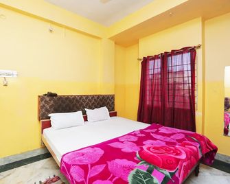 Hotel Savitri - Deoghar - Slaapkamer