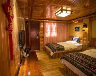 Wanxinglong Hostel - Dêqên - Habitación
