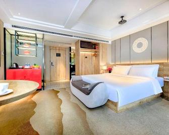 Hongyan Holiday Riverview Hotel (Chongqing Jiefangbei Hongyadong Branch) - Chongqing - Habitación