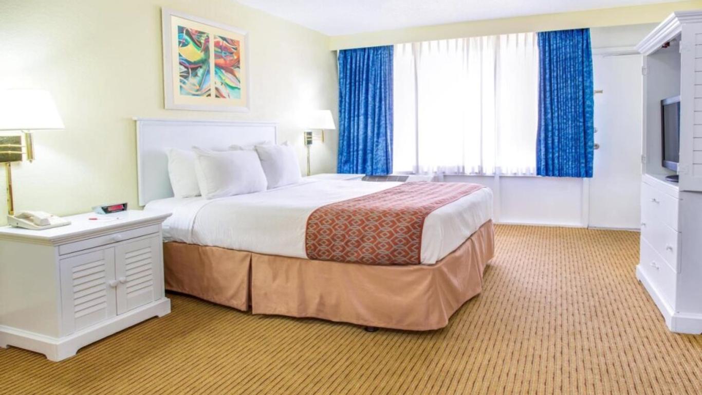 Apm Inn & Suites