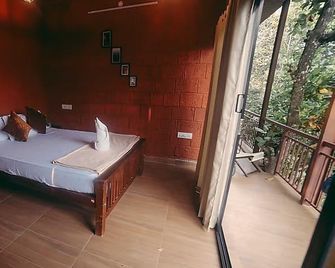 Tulsi Village Retreat Munnar - Munnar - Slaapkamer