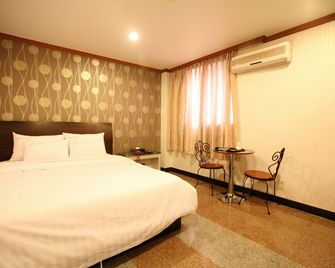 Hotel New World - Seül - Habitació