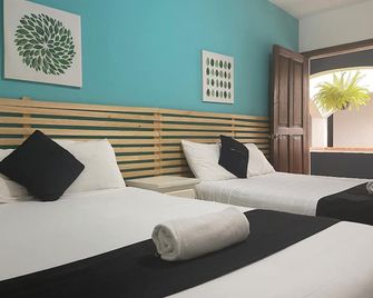 Hotel Jardines de Luz - סן קריסטובל דה לס קאסאס - חדר שינה